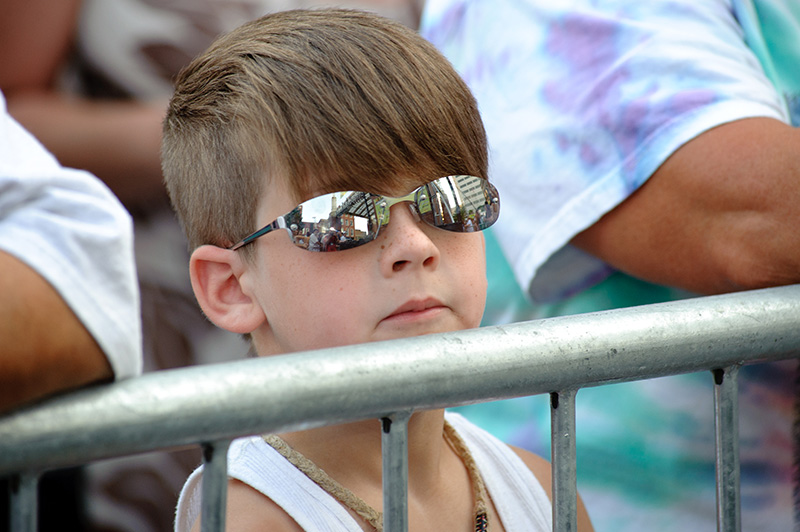 young music fan on the rail